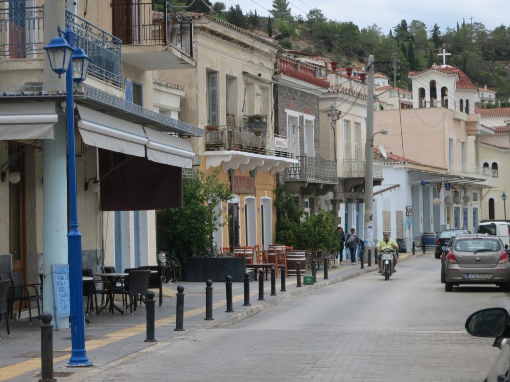 A row of two-story buildings along a road