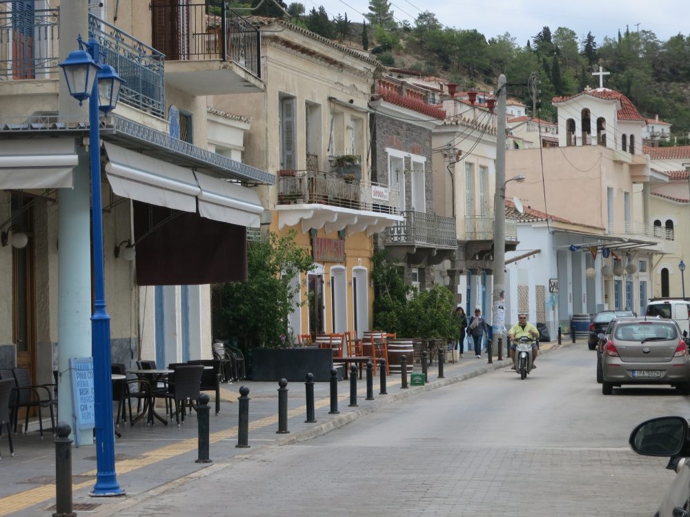 a view of the street along the water on Poros