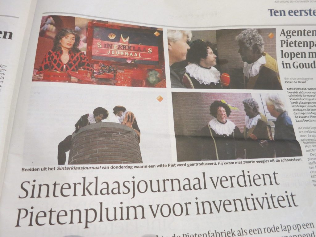 An article in the newspaper about the Sinterklaas news program on TV. This year for the first time a White Pete and a Sooty Pete were included.