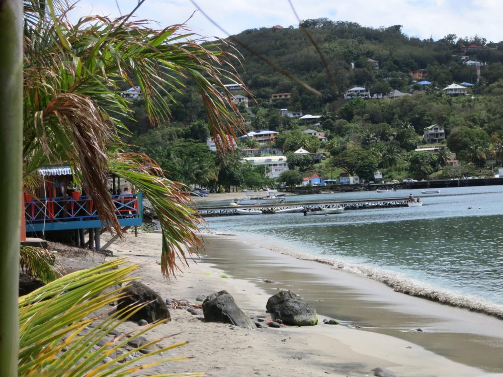 a view down the beach, taken from the restaurant used in the filming of Death in Paradise