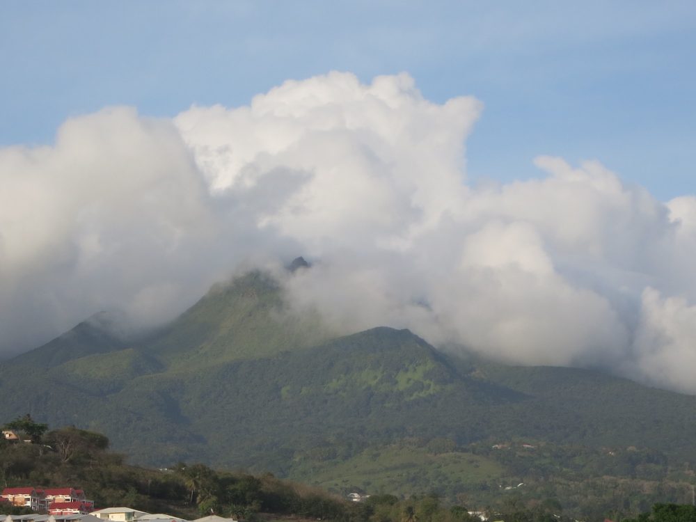 view of La Soufriere volcano, topped with clouds
