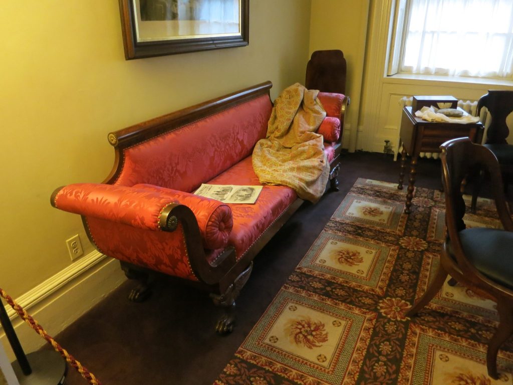 view of a period sofa in the sitting room of Merchant's House Museum