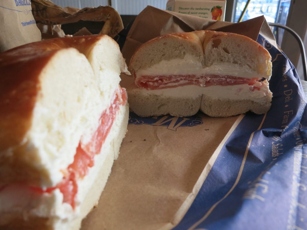 close-up of a plain bagel with cream cheese and lox