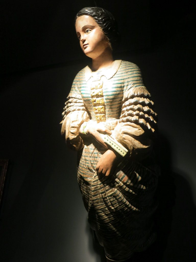 a close-up of a wooden figurehead in the Maritime Museum in Lloret de Mar