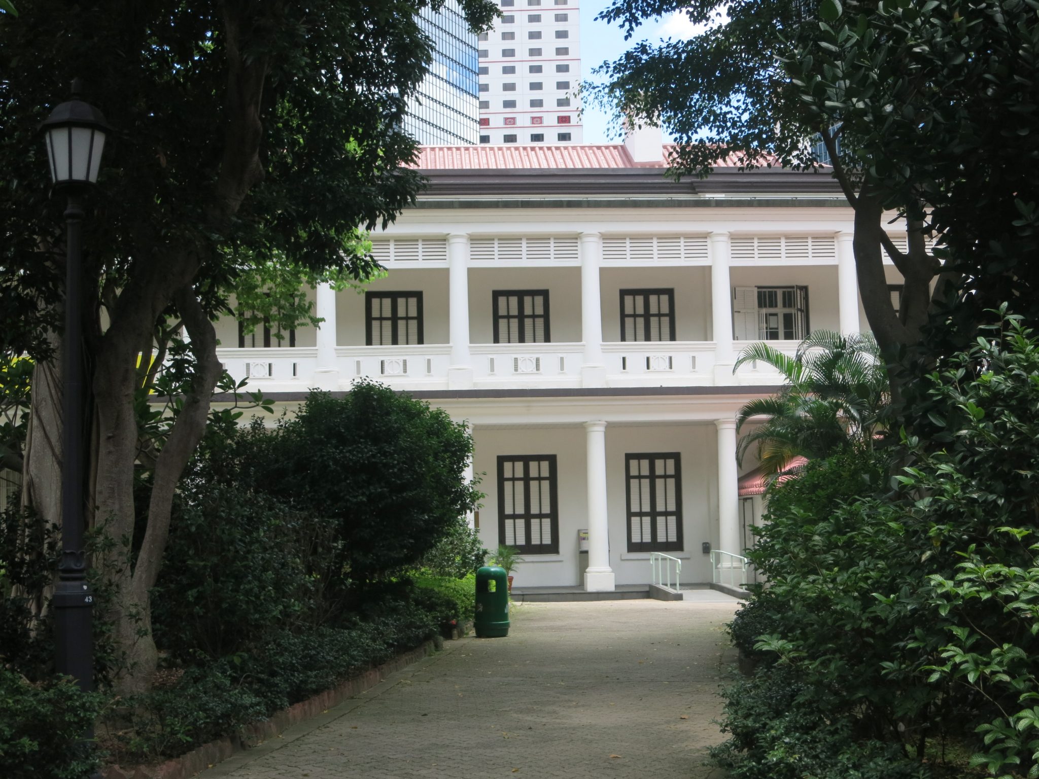 a view of the front of the colonial-era Flagstaff House in Hong Kong Park
