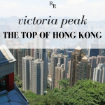 Text: Victoria Peak: The top of Hong Kong. Image: a view from above the tall skyscrapers of Hong Kong.