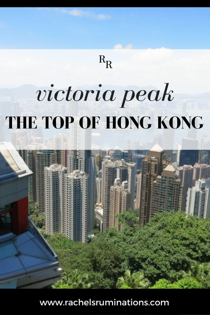 Text: Victoria Peak: The top of Hong Kong. Image: a view from above the tall skyscrapers of Hong Kong.