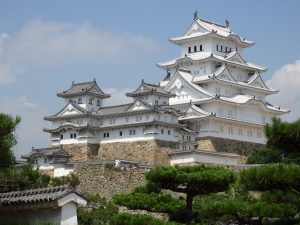 The ornate, enormous, white Himeji Castle looms.