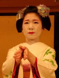 closeup of a Maiko performing at Gion Corner in Kyoto