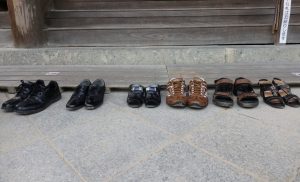 shoes lined up outside a temple in Himeji, Japan