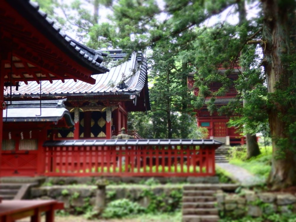 a cluster of small red-painted temples in Nikko, Japan: what to see in Nikko