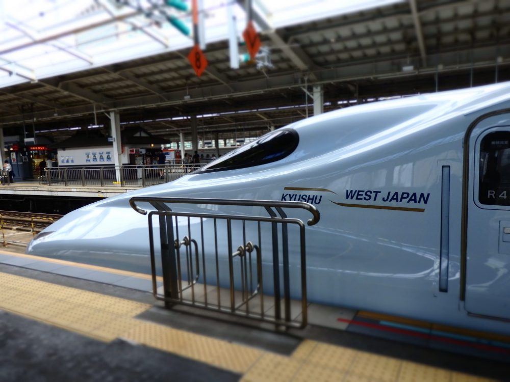 the front of the bullet train on Japan Rail from Osaka to Hiroshima: white train with a pointy front.