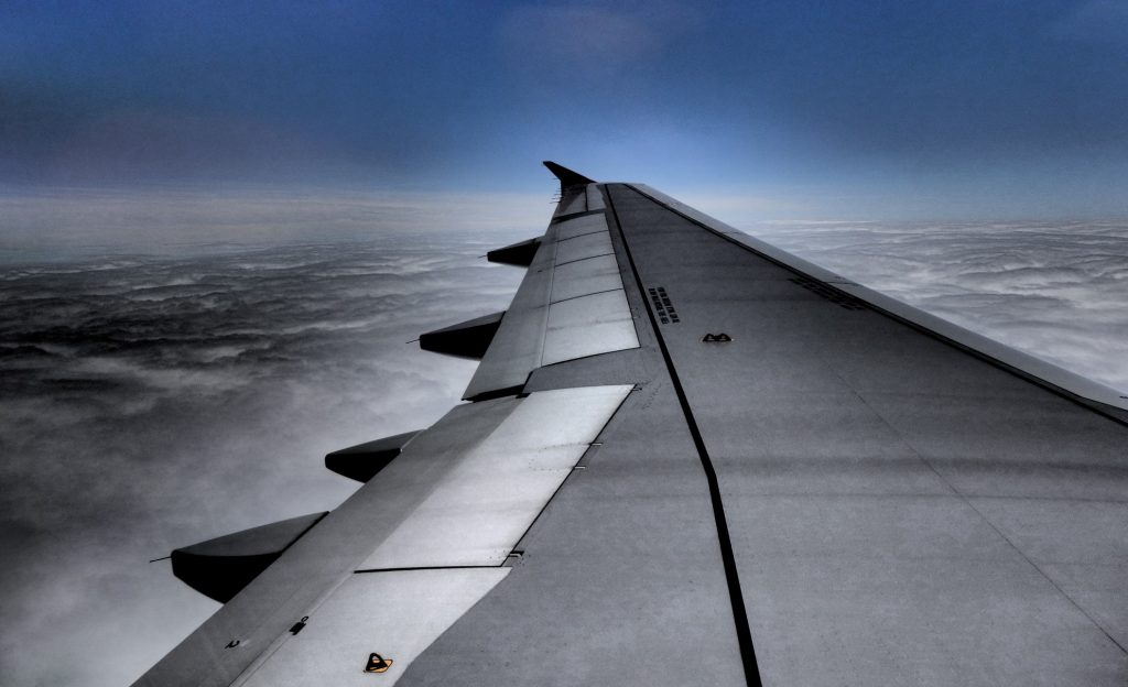 wing view of a flight at cruising altitude