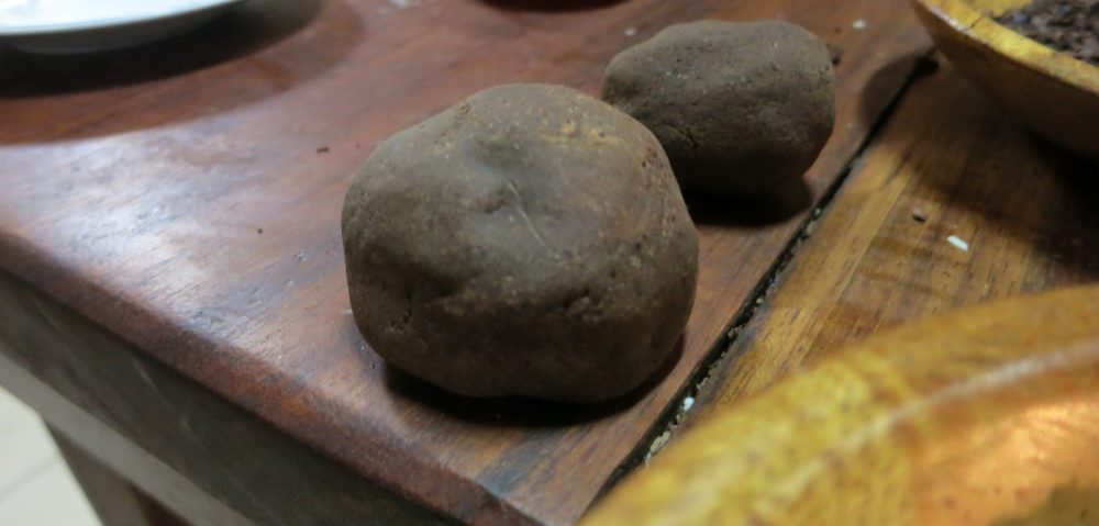 Im not sure exactly what step these balls of ... something ... were in the process from cacao to chocolate. I didnt catch what the woman said.