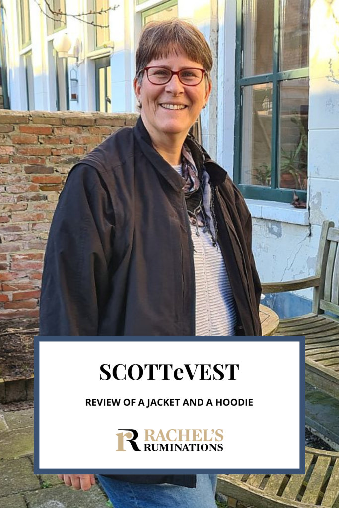 Text: SCOTTeVEST: review of a jacket and a hoodie (and the Rachel's Ruminations logo). Image, me wearing the black SCOTTeVEST jacket, zipped open in front.