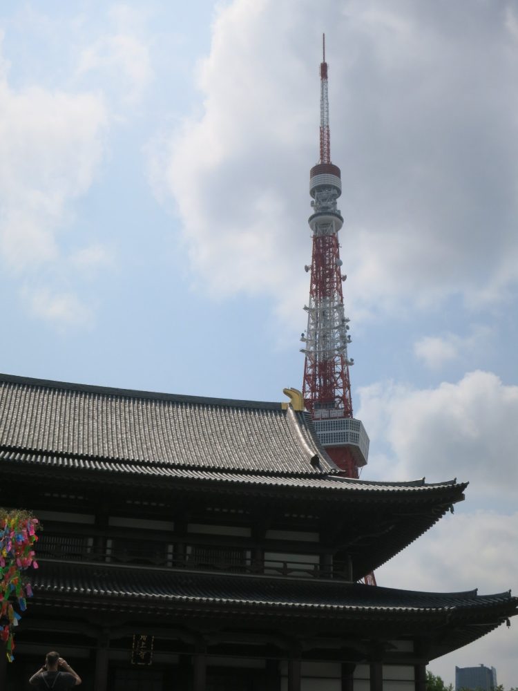 Tokyo Tower visible behind Zojoji temple in Shiba Park