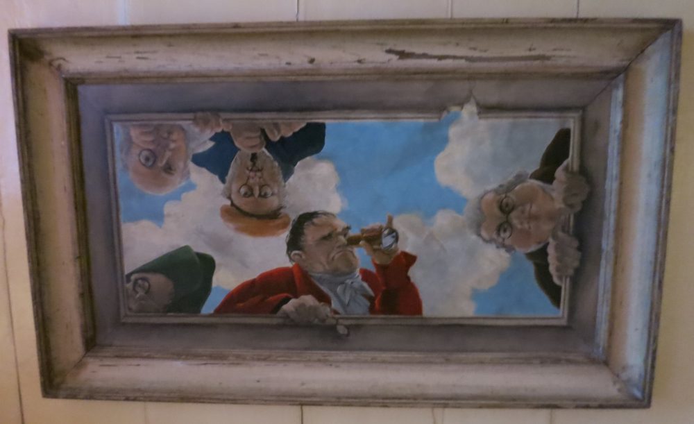 A whimsical painting on the ceiling of the top floor of the Brilmuseum in Amsterdam.