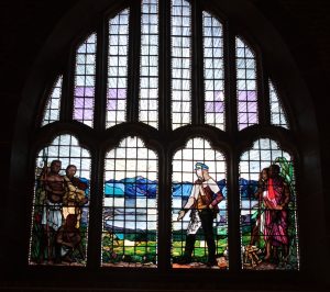 The stained glass window above the entrance to Livingstonia church