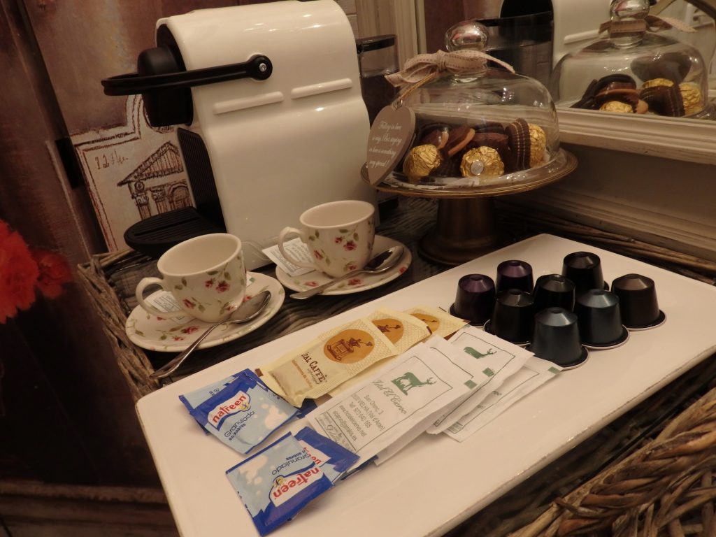 the coffee machine and sweets that welcomed us to our room at Hotel El Ciervo