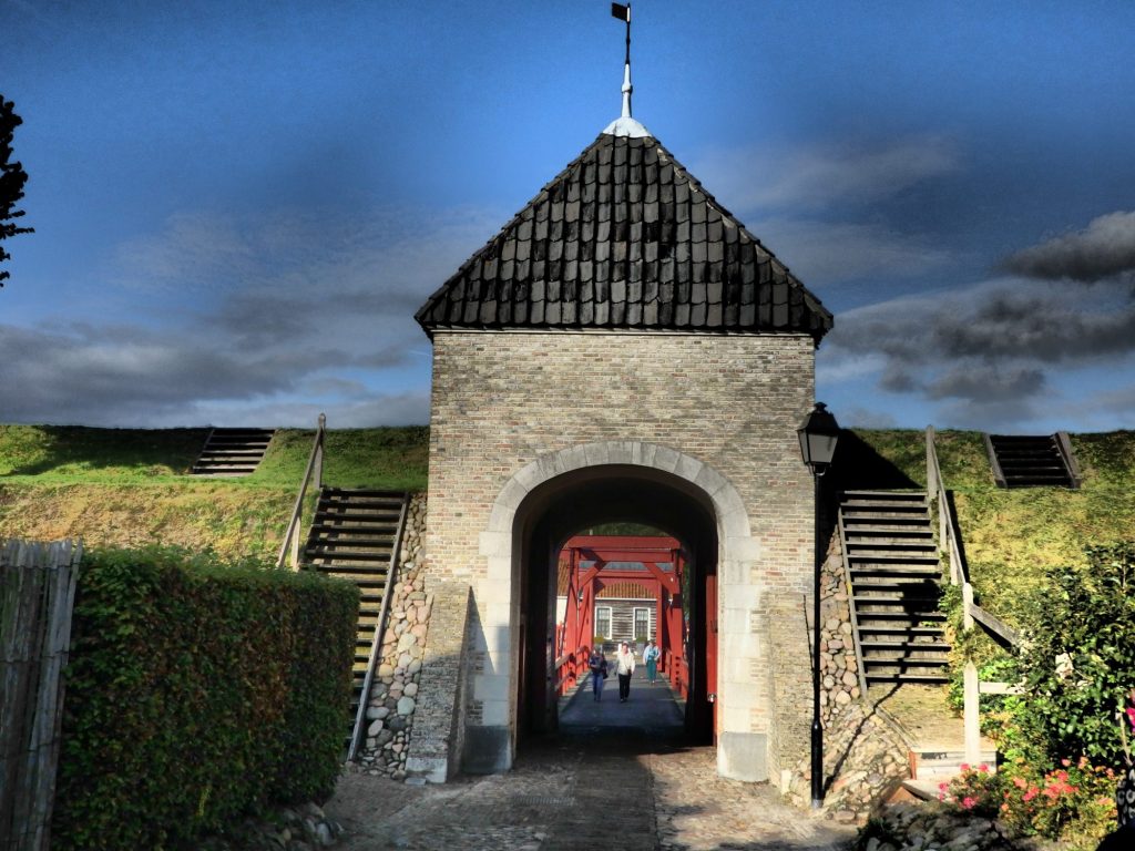 This view looks out of the entrance gate to Bourtange. The earthen embankments on either side are the walls of the fortress.