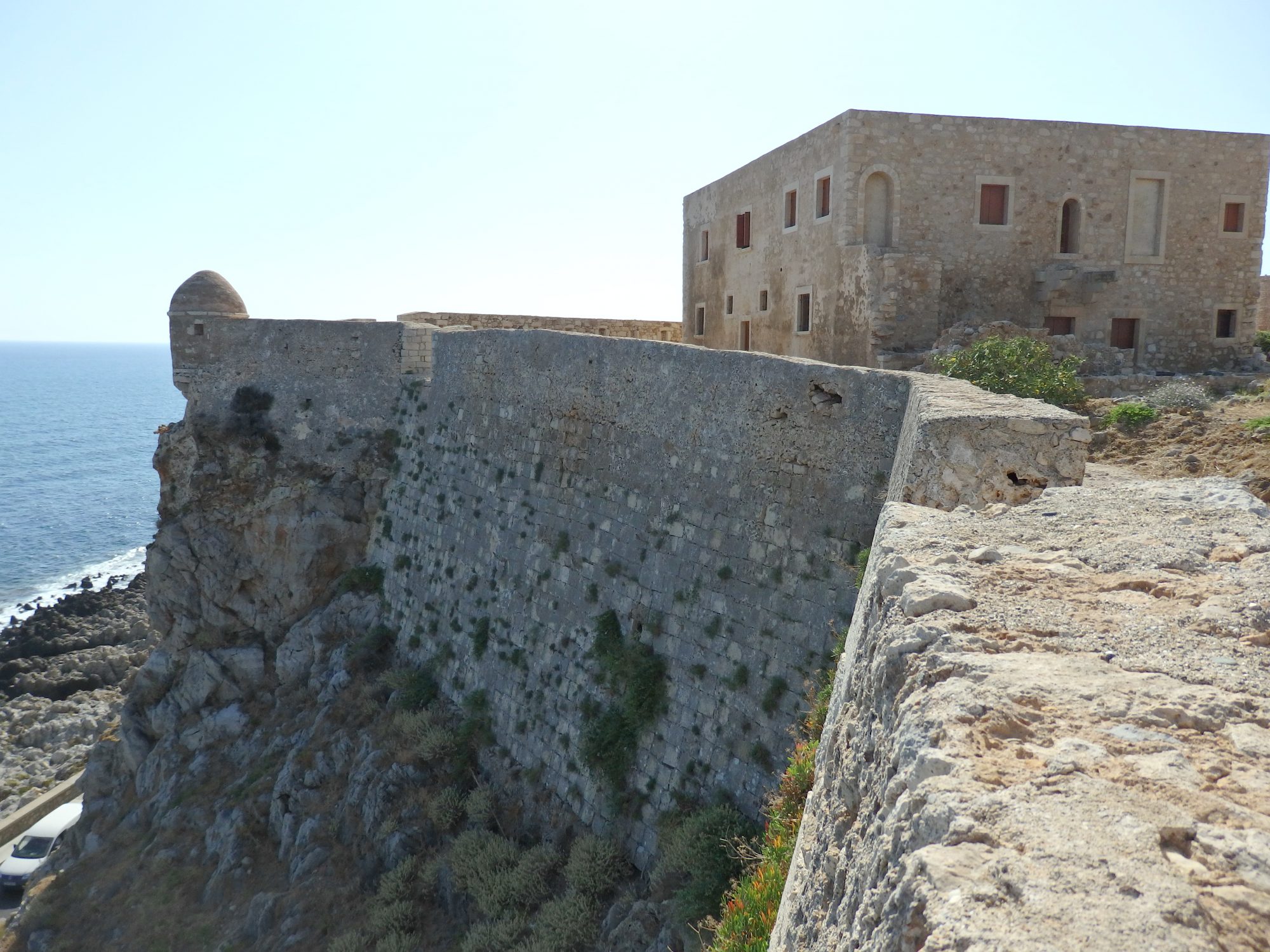 This view gives an idea of how the Rethymnon fortress walls tower above the sea. The building is the House of the Councillors.