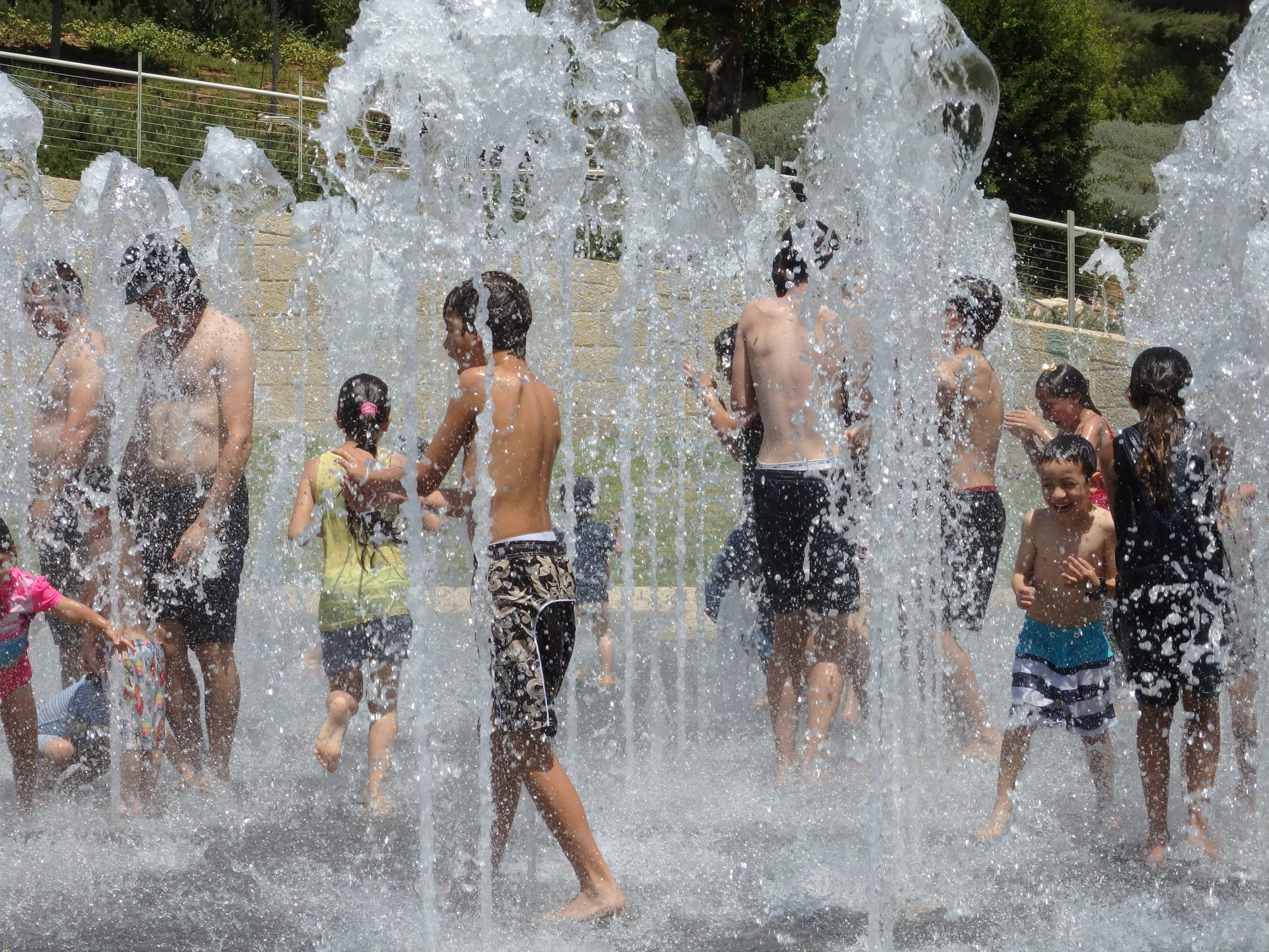 A fountain just below the old walled city of Jerusalem offers relief from the summer heat.