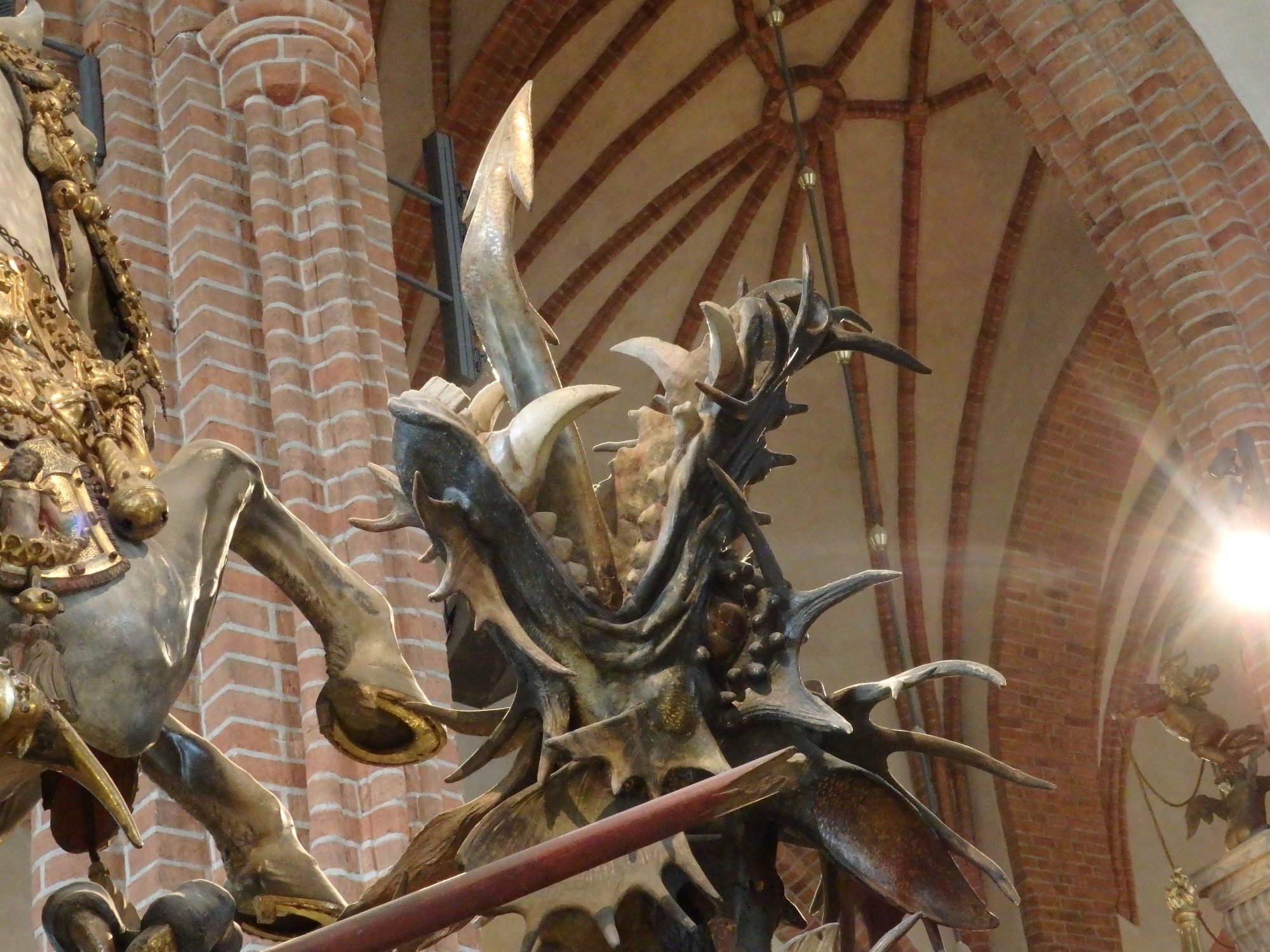 a detail of the statue of St George in Storkyrkan showing the dragon's head: Stockholm, Sweden