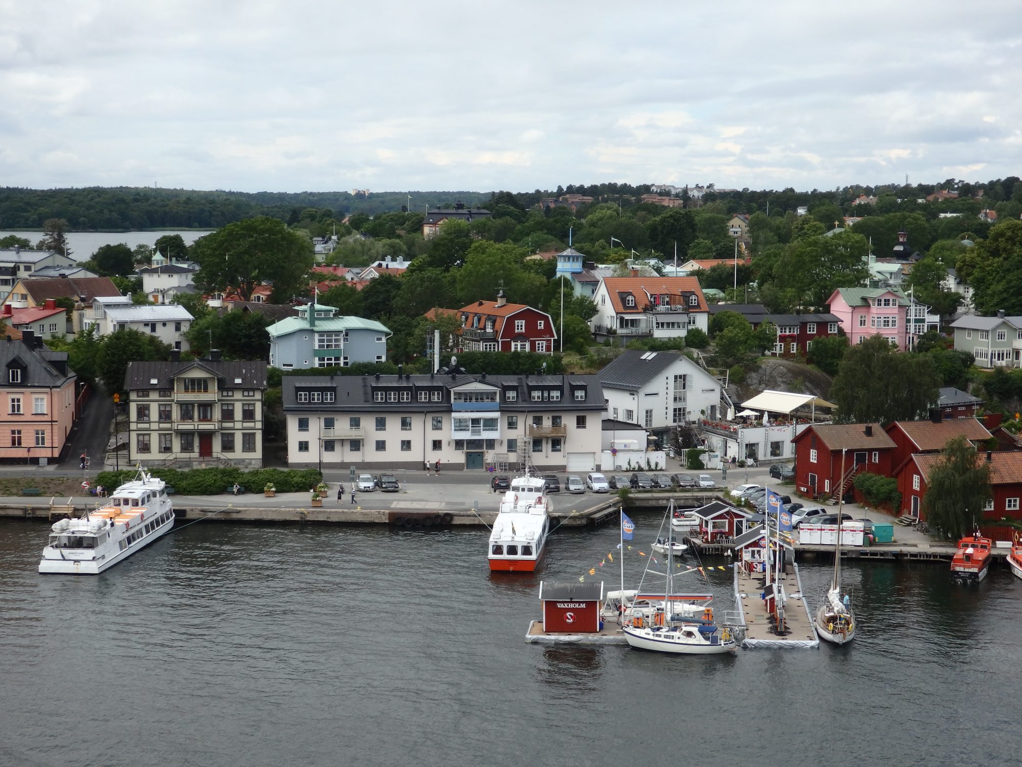 the small town across a narrow channel from Vaxholm, as seen from Vaxholm's tower roof