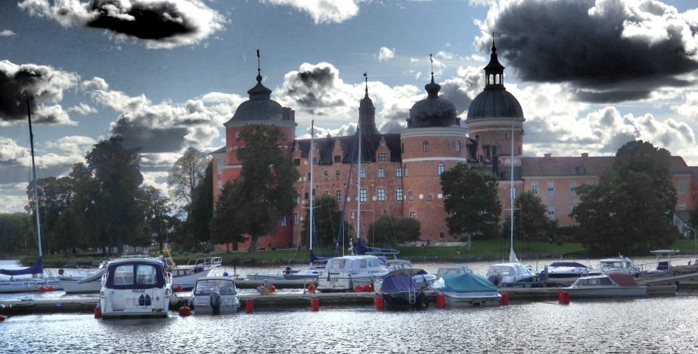 A castle as seen across the water.