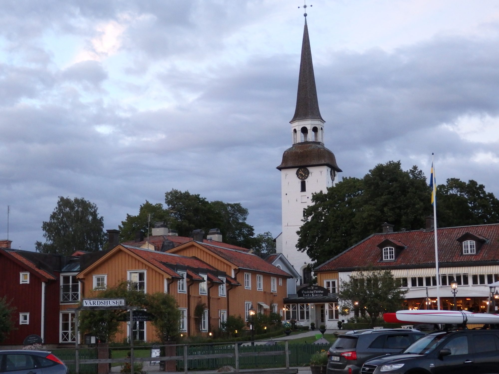 Gripsholms Värdhus, with the church towering above it, Mariefred, Sweden
