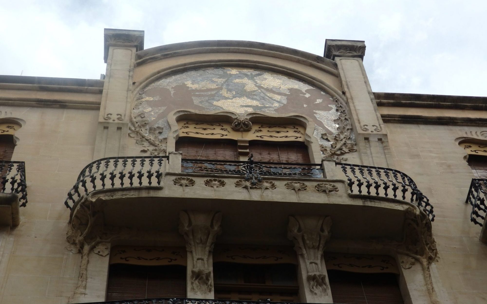 You can see a similarity to Art Nouveau and Jugendstil in the artwork on the facade of this building.