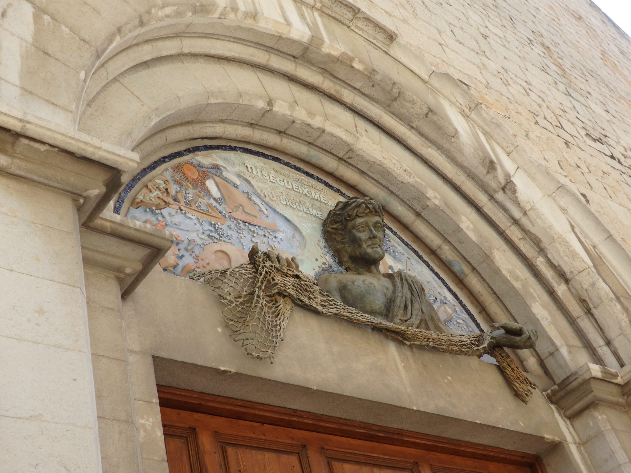 above the entrance to the church of Sant Pere in Figueres, Spain