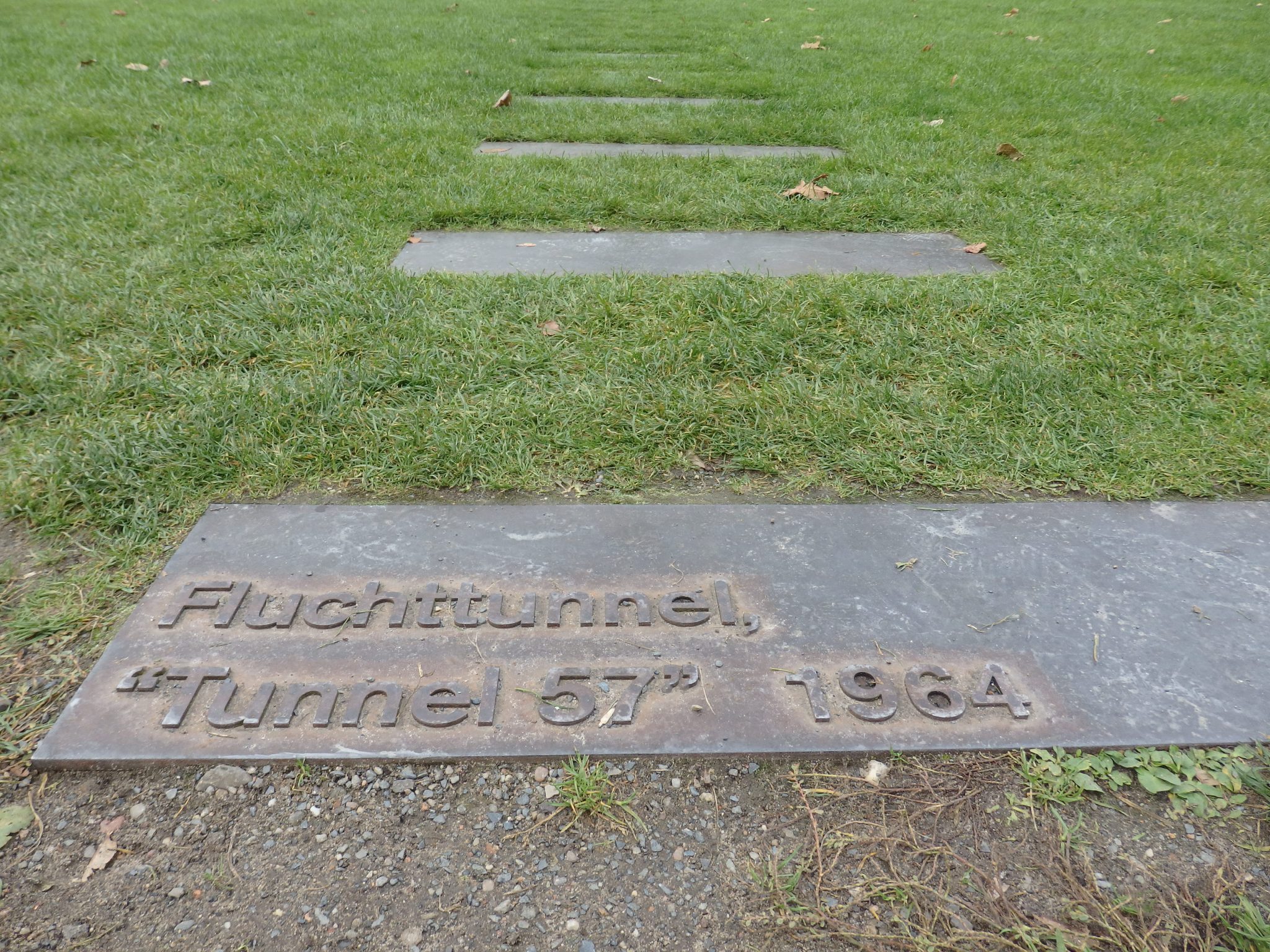 These metal plates mark the route of one of many tunnels dug under the Berlin Wall.