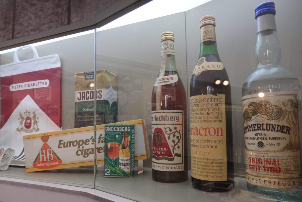 Vintage bottles of alcohol and cigarettes.