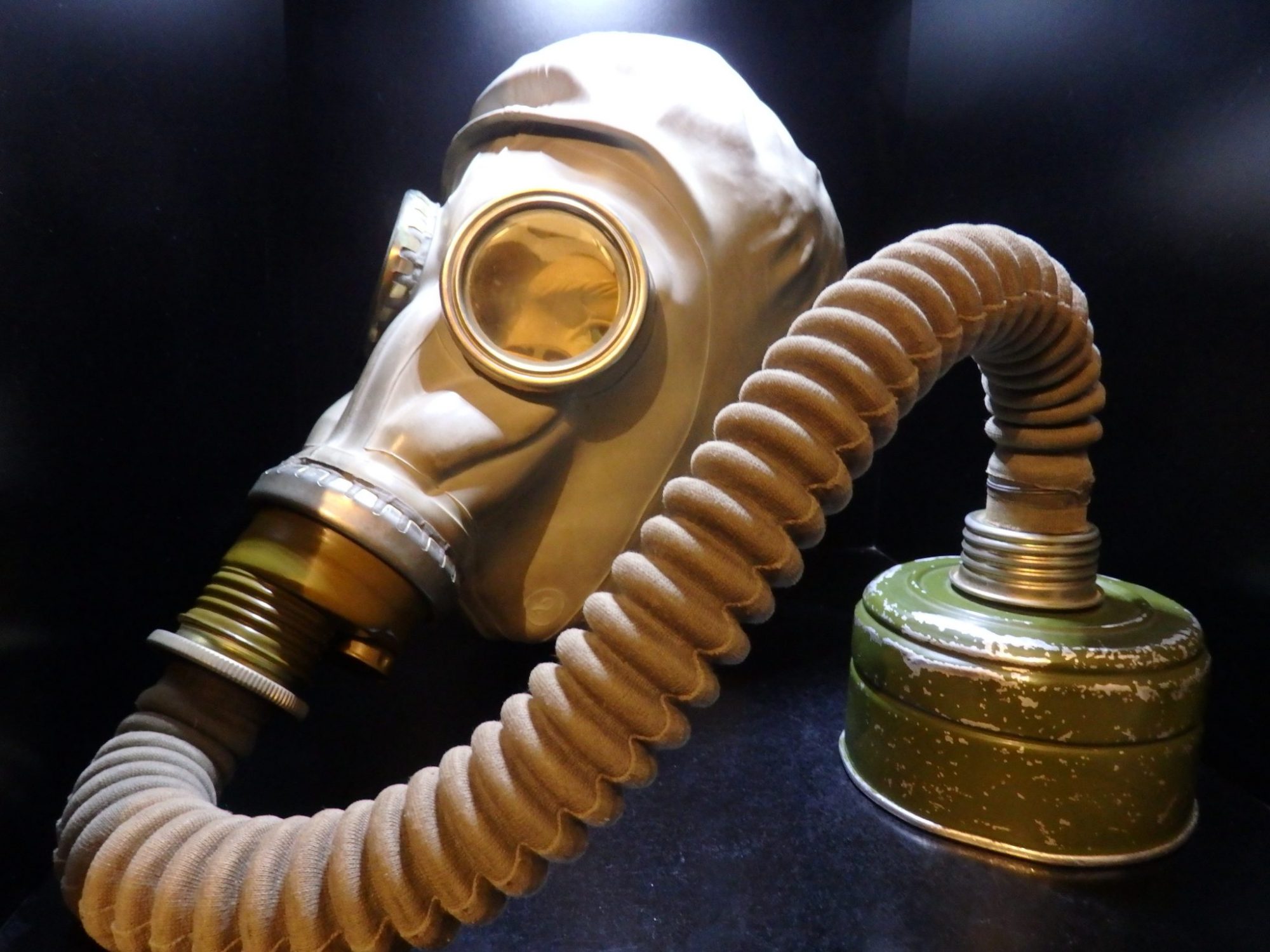 a gas mask in a cupboard in the DDR Museum