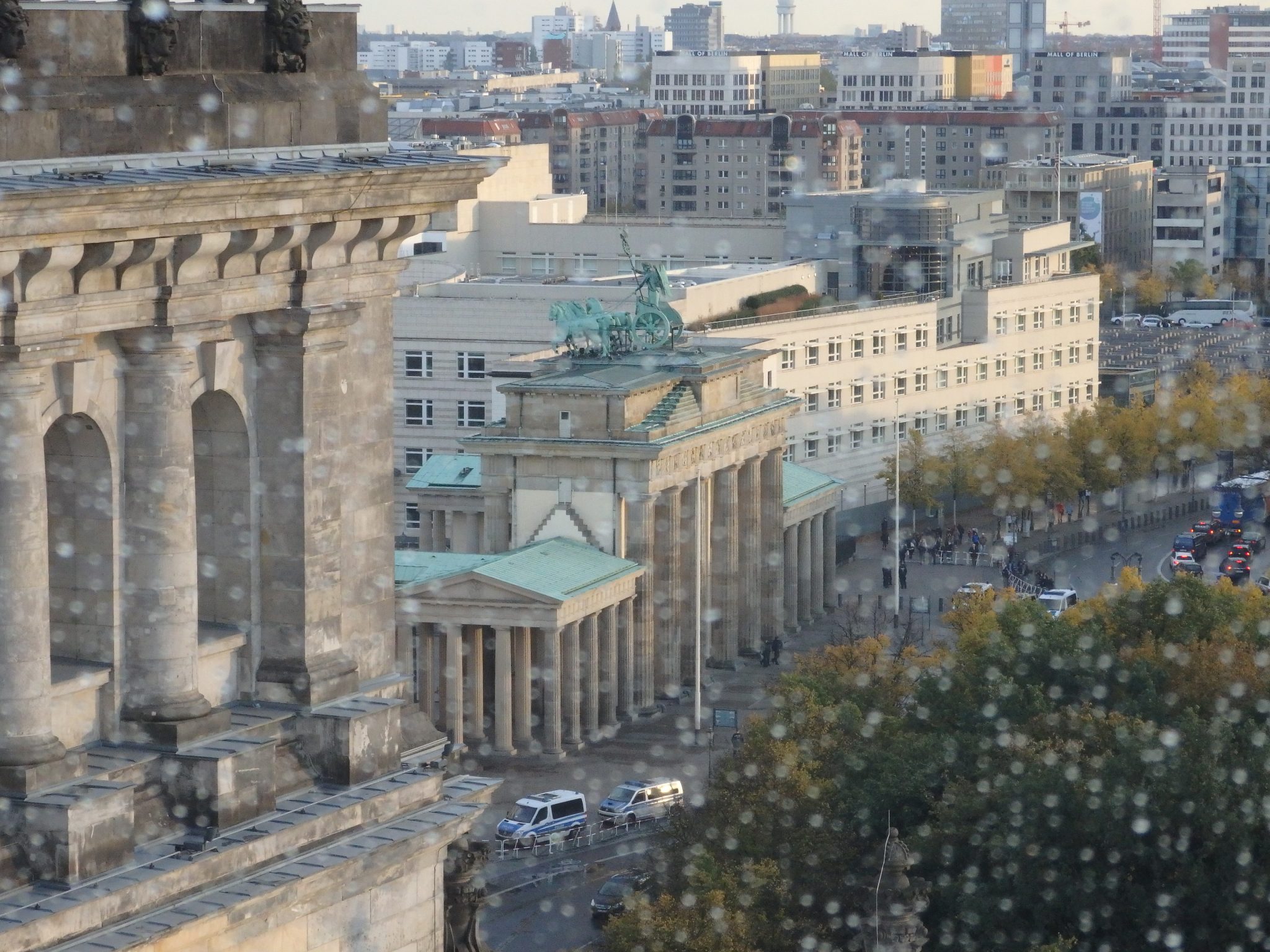 This picture shows the famous Brandenburg Gate. Built in the late 18th century, it was meant to represent peace. During the Cold War it was on East German territory and inaccessible to both East and West Germans. The white building just beyond it is the new US Embassy.