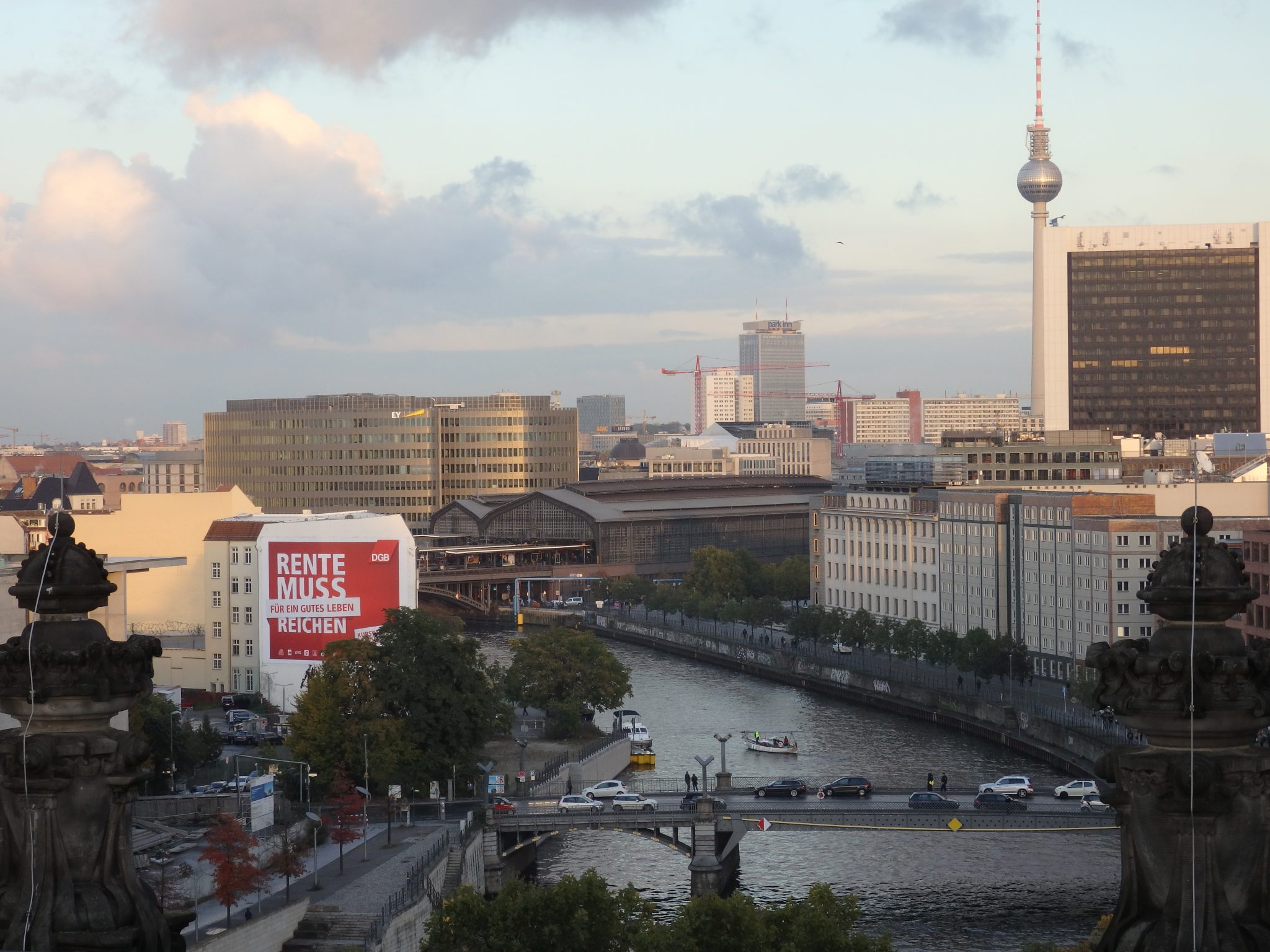 One of many views from the Reichstag dome. Here, on the Spree River, you can see Friedrichstrasse Station, the low brown building; the Television Tower; and, in front of the tower, the International Trade Center.