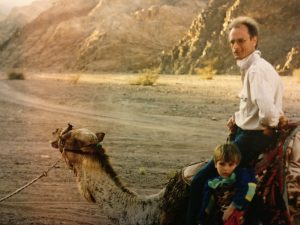 This snapshot shows our son suffering the indignity of being transported in a camel's sidesaddle because he wasn't big enough to ride the camel like the rest of us.