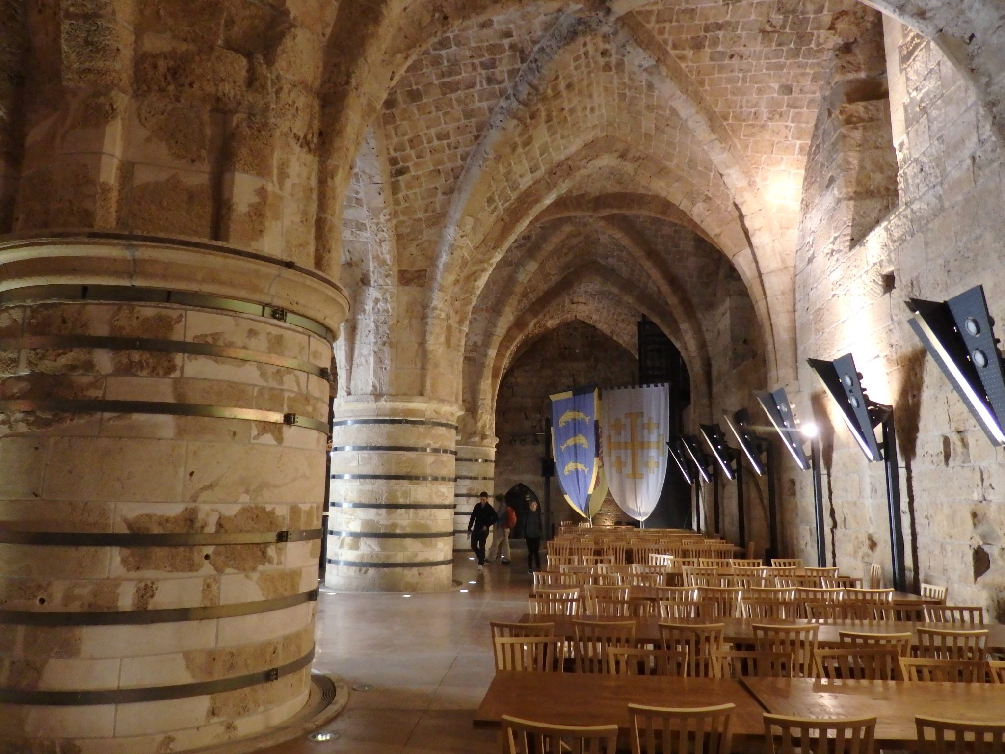 A hall in the Knights Hospitaller's fortress, with massive columns supporting gothic cross arching.
