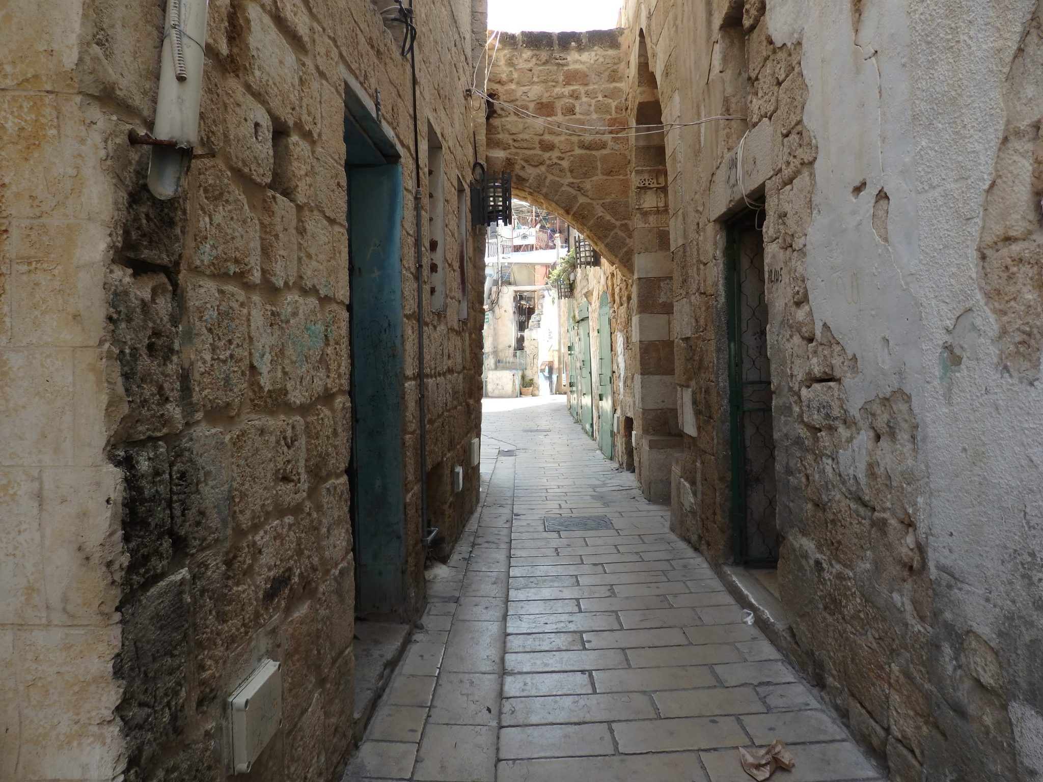 A narrow street in Akko old city shows remnants of its history.