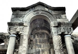 The Torah ark at Um el Kanatir shows detailed carvings.