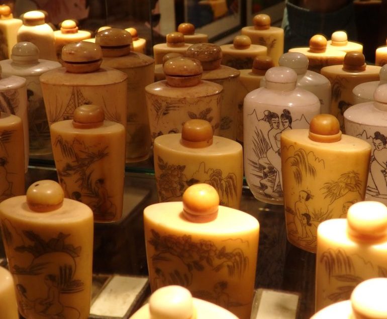 bottles made in France with images of Asians in the Erotic Museum Amsterdam