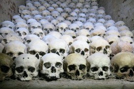 a careful arrangement of skulls inside the ossuary: Macabre sightseeing in Brno