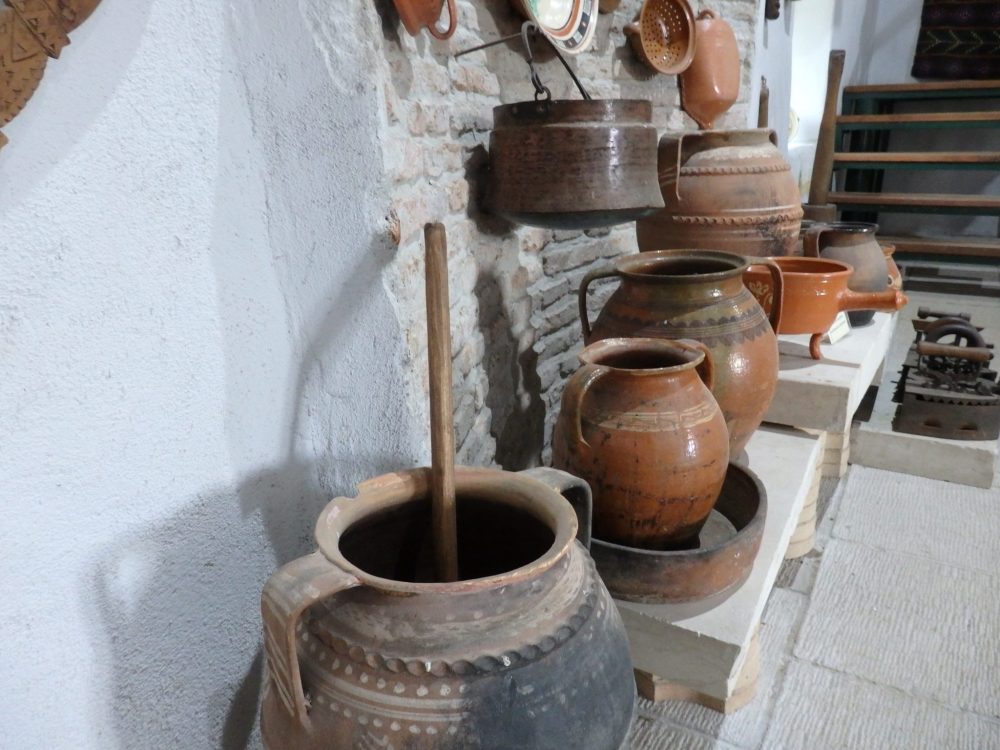 A display of household objects in the museum at Calnic fortified church