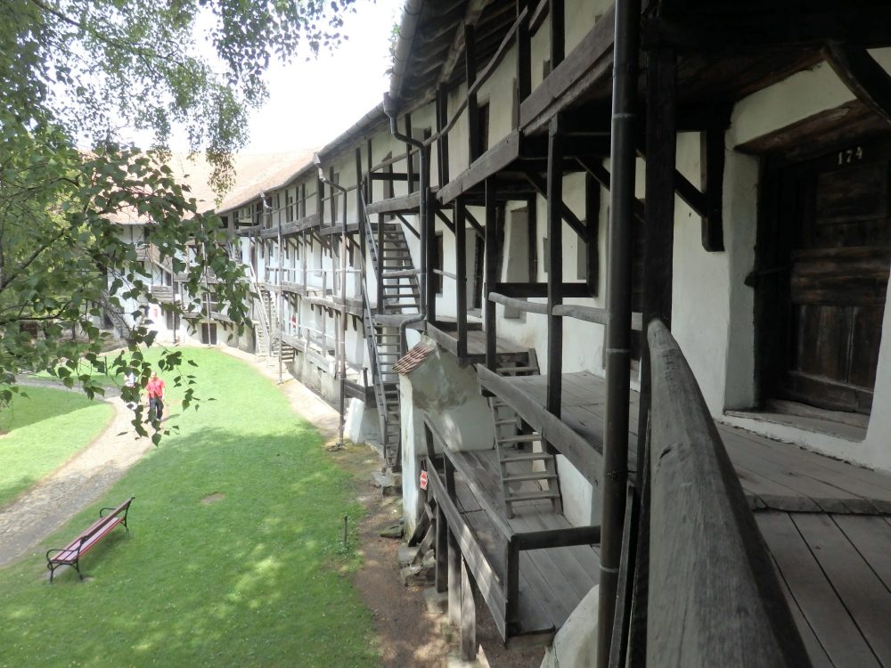 A view of some of the exterior walkways and rooms inside the defensive wall of Prejmer fortified church.