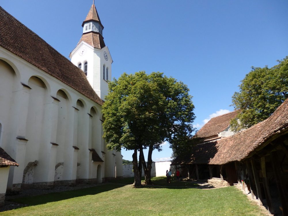 Bunesti church on the left, with fortifications on the right.