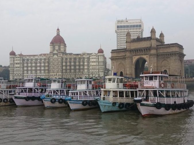 I took this as we were leaving the dock. The archway on the right is the Gateway of India. The ornate building on the left is the Taj Hotel, an extremely elegant colonial-era building. In the foreground, moored ferries.