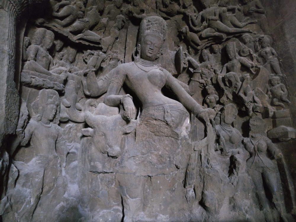 This bas-relief is to the left of the three-headed version of Shiva.