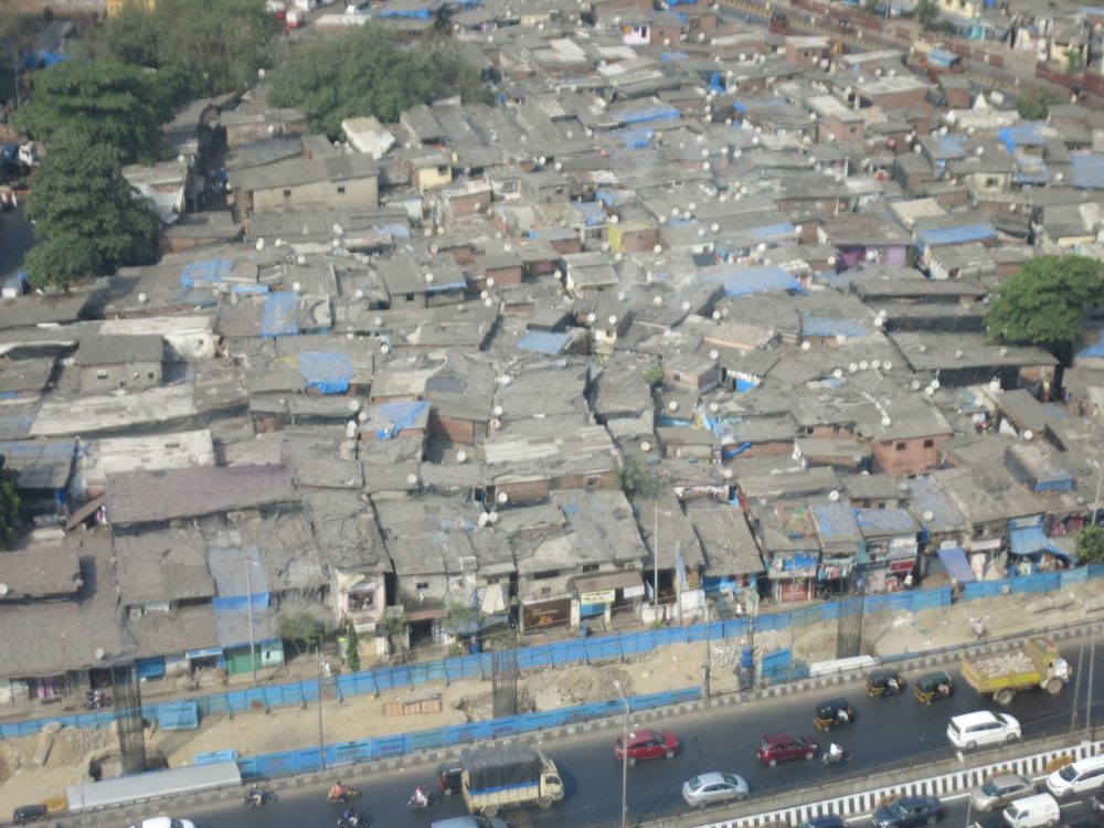 I apologize for the graininess of this photo: my compact camera can't zoom very well. I took this from the 18th floor of my hotel. The slum you see is not Dharavi, but rather one of the 2000 or so other slums in Mumbai. This picture gives you an idea of how narrow the houses are. Dharavi slum tour