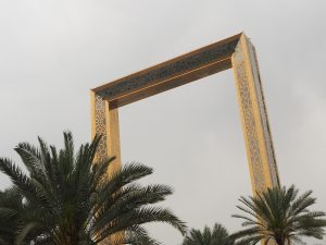 The Dubai Frame, in this picture, looks like it's just behind the palm trees, and only two or three stories high!